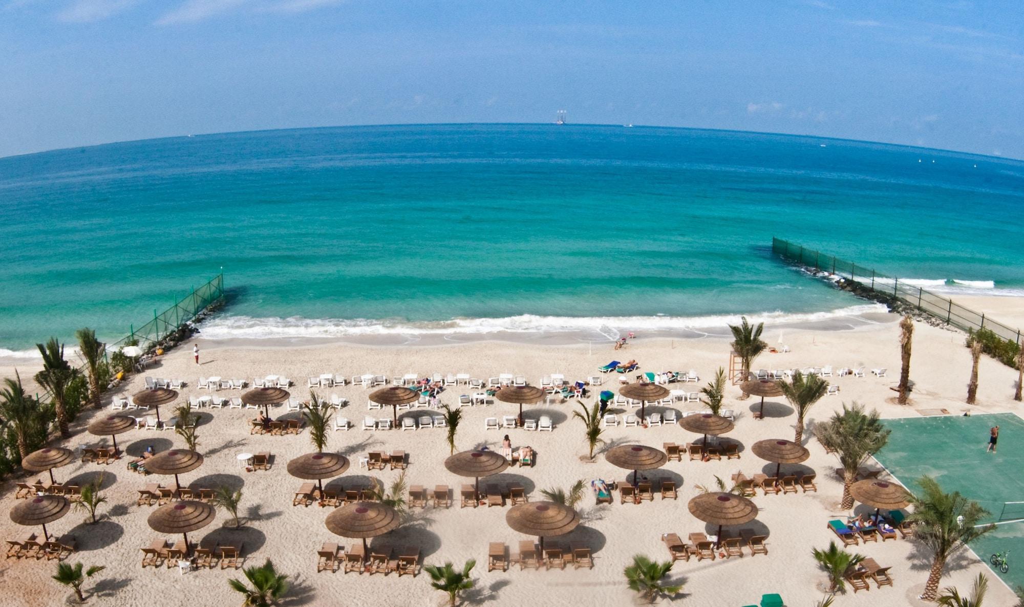 منتجع وسبا صحارى بيتش الشارقة المظهر الخارجي الصورة Beach at Jumeirah Beach Hotel