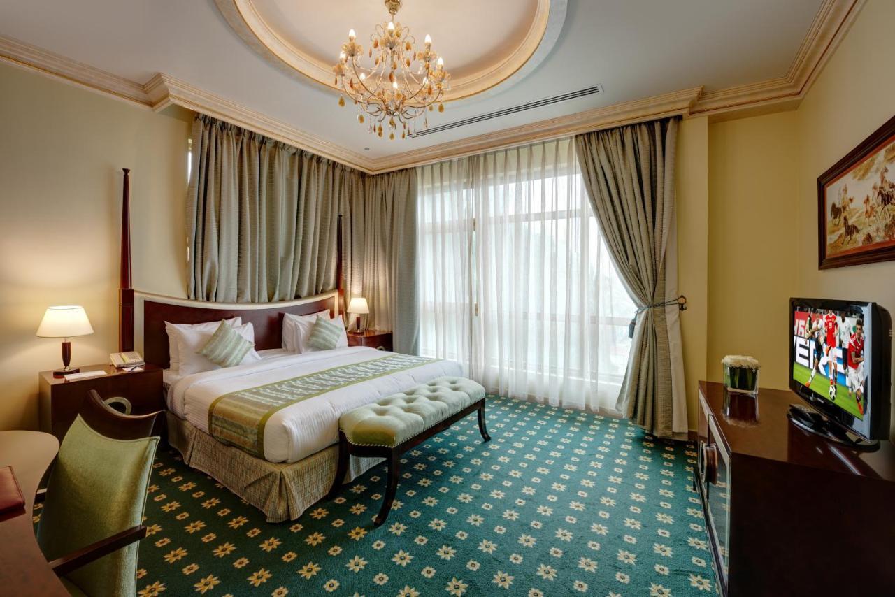 منتجع وسبا صحارى بيتش الشارقة المظهر الخارجي الصورة A bedroom at the hotel